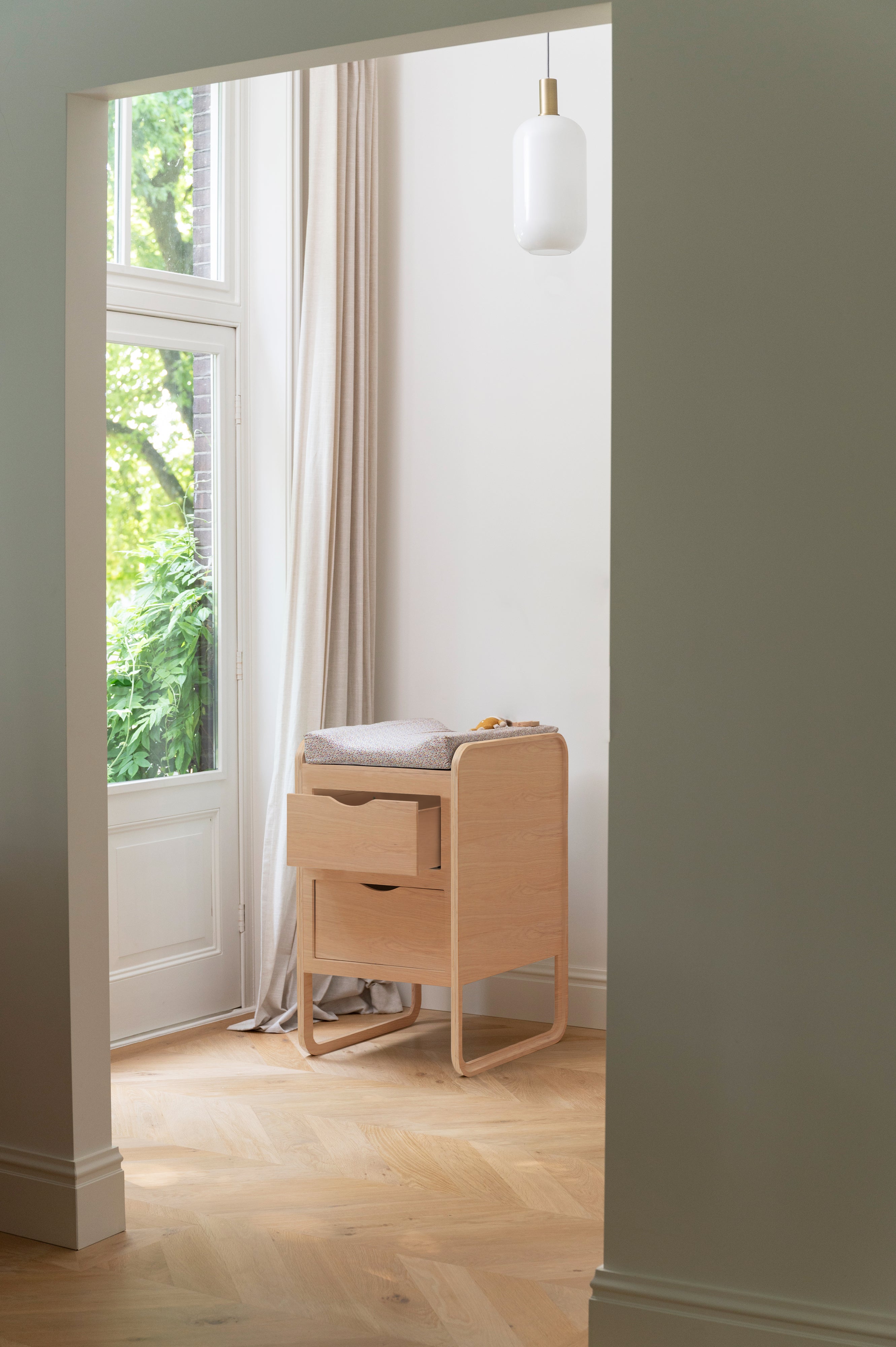 Nofred baby Changing Table in the corner