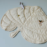Nofred Sand Leaf Blanket with toys on it