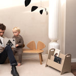 Dad and son reading a book from Nofred Beige Bookholder