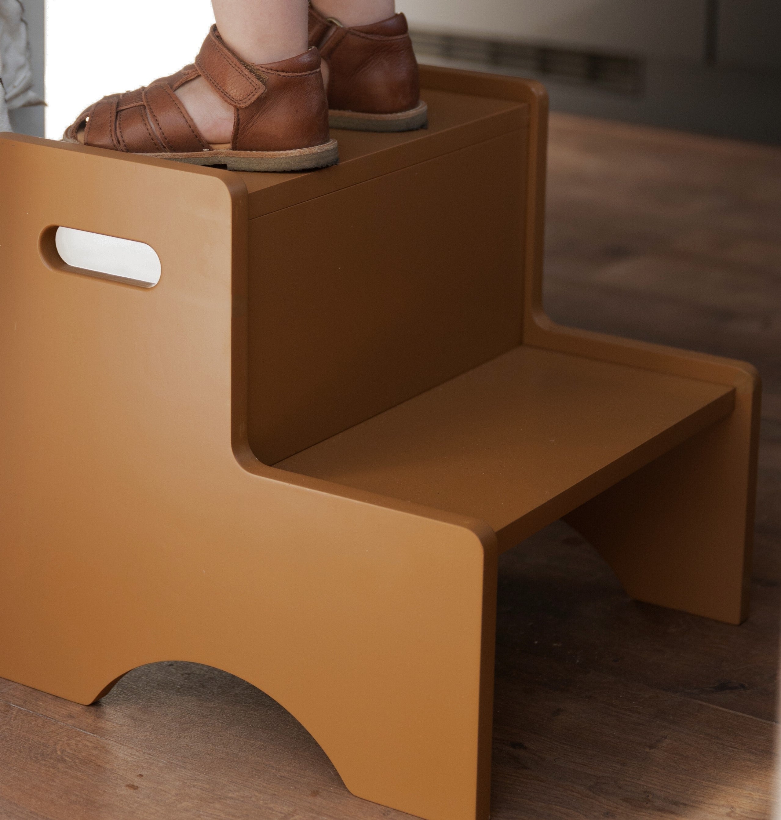 Child standing on Nofred Brown Step Up Stool