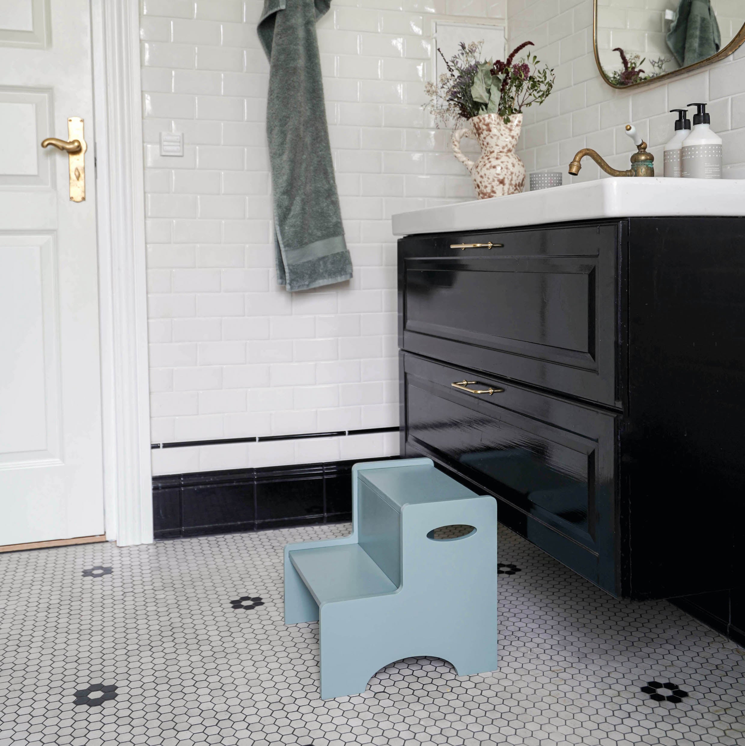 Nofred Olive Green Step Up Stool in the bathroom