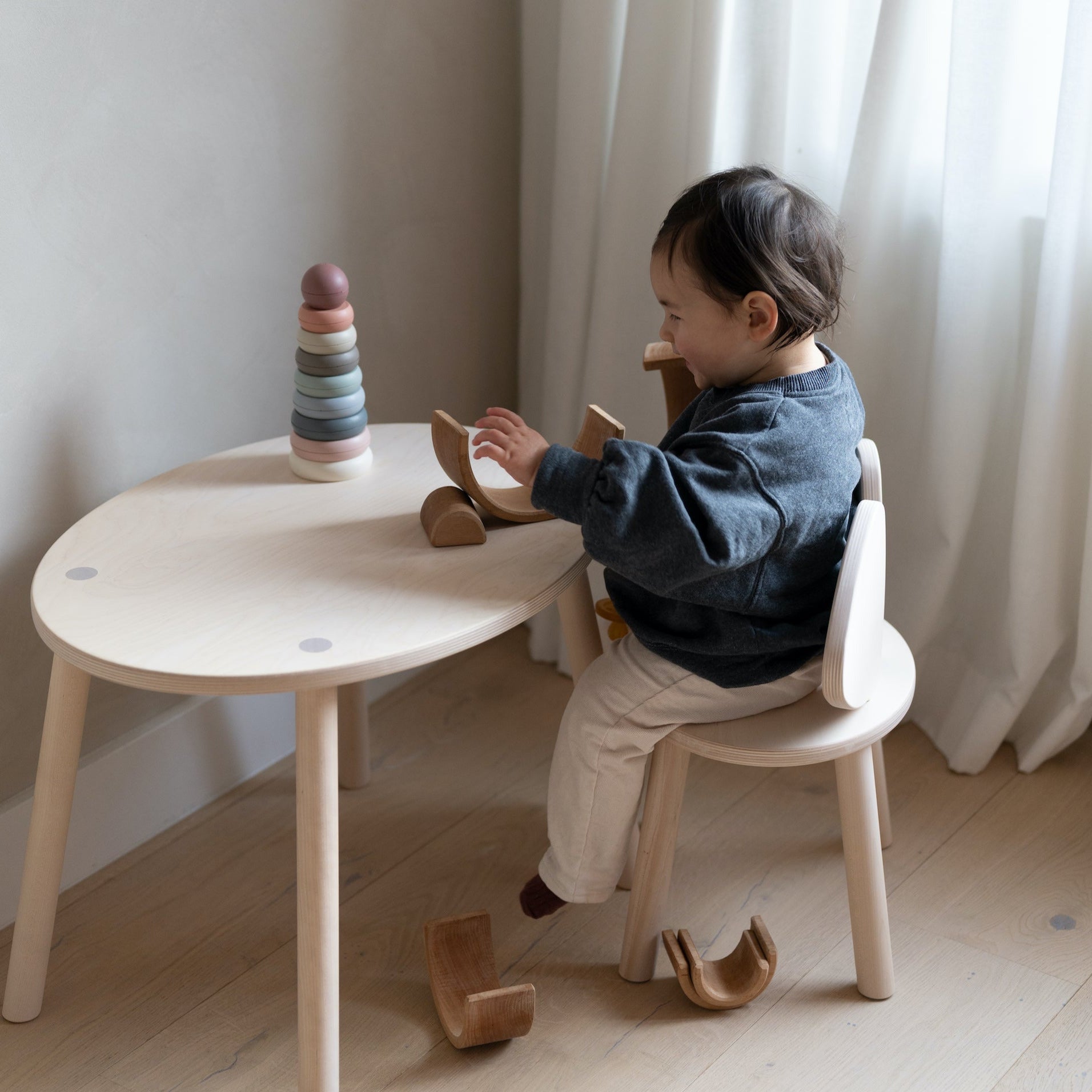 Girl playing at Nofred Birch Mouse Chair and Table Set