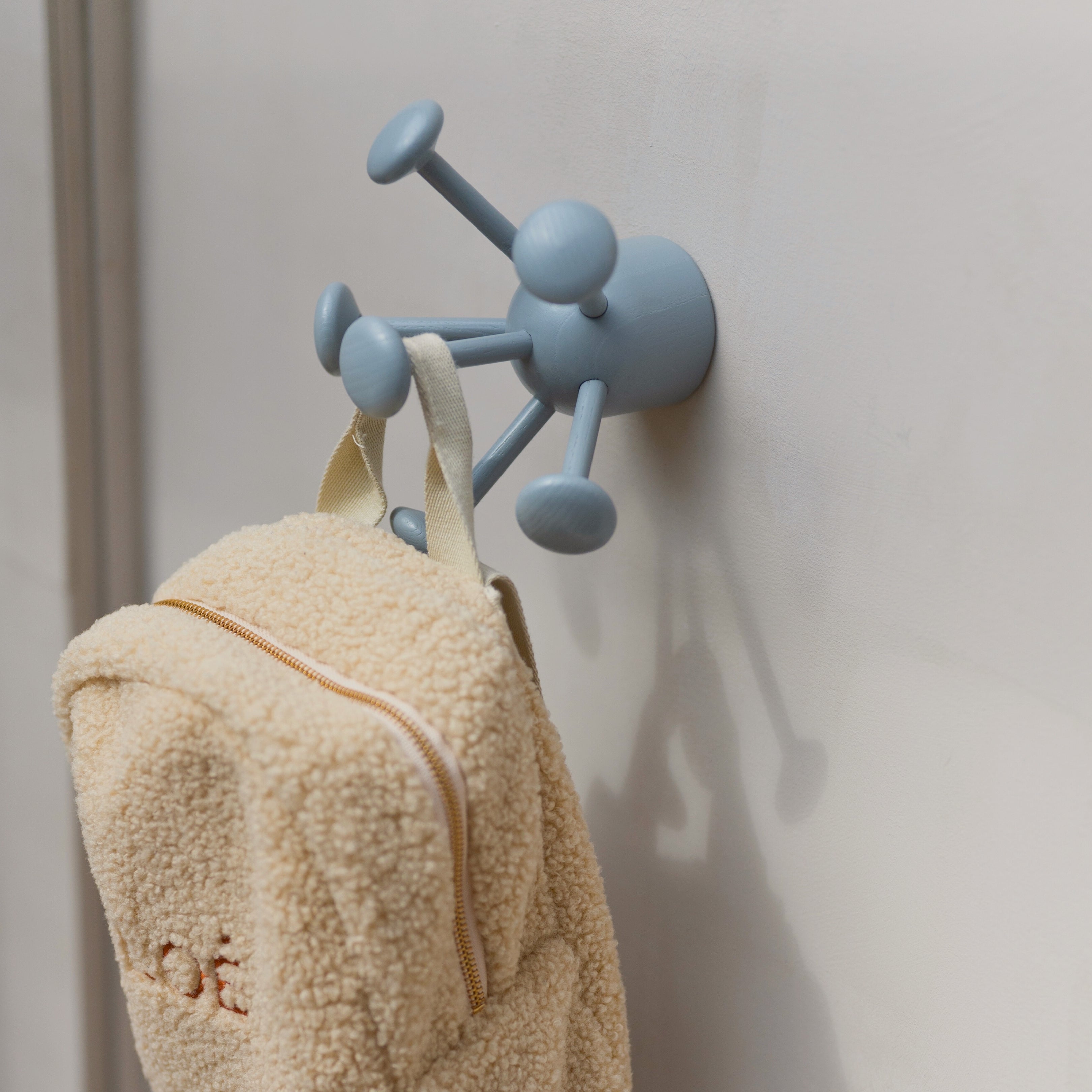 Backpack on the Nofred Grey Bug Wall Hook