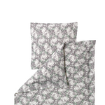 A folded bedding set featuring a duvet cover and pillowcase with an all-over repeating pattern of gray and muted green leafy vines on a warm off-white background.
