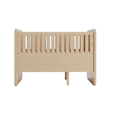 A light natural wood baby crib guard with vertical slats, shown from the front on a solid white background.