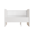 A white wooden toddler bed with a slatted backrest and solid side panels, shown from a front angle on a plain white background.