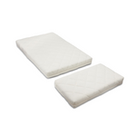 Two quilted mattress toppers in off-white, one rectangular and one square, displayed on a clean white background.