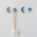 Accessories hanging on blue star and moon hooks