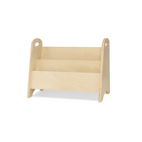 A three-tier wooden magazine rack made of light natural wood, shown on a plain white background.