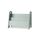 A three-tier wooden magazine rack in a muted sage green color, shown from a three-quarter angle on a plain white background.