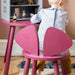 Girl playing with furniture set
