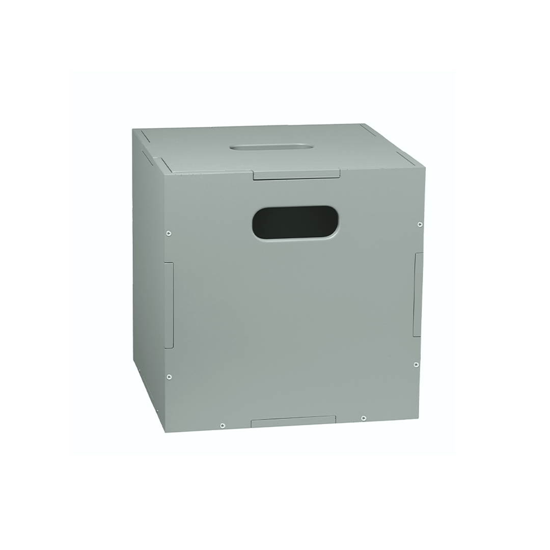 A gray metal storage box with a rectangular handle cutout on the front, shown at a three-quarter angle against a plain white background.