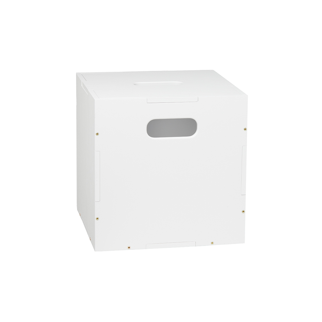 A white cardboard shipping box with a rectangular cutout handle on the front, shown at a three-quarter angle against a plain white background.