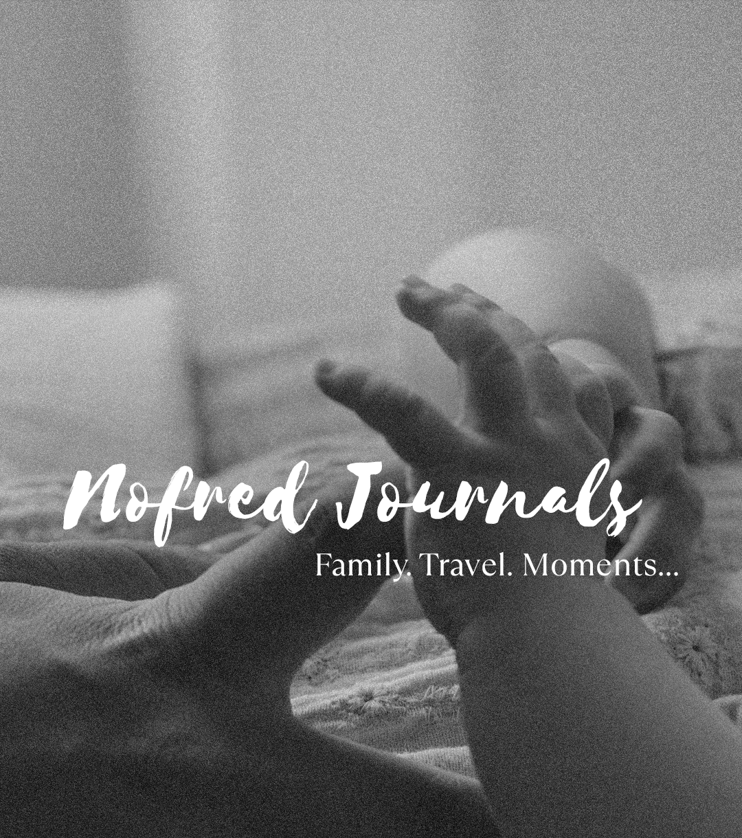 Black and white photo of a baby's hand reaching towards an adult's hand with text overlay about Nofred Journals.
