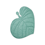 A mint green quilted leaf-shaped blanket or play mat with a small loop handle, shown on a plain white background.