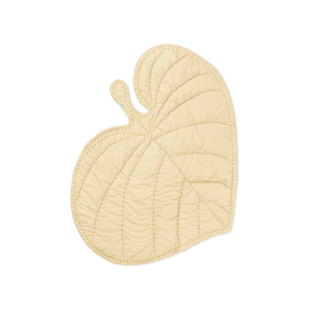 A pale cream quilted leaf-shaped oven mitt with a small handle, shown on a solid white background.