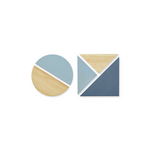 Two modern geometric coasters on a plain white background. One coaster is circular, and the other is square, both featuring a color-blocked design with light blue, slate blue, and natural wood grain sections separated by white borders.