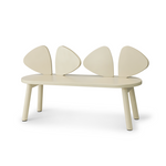 A modern minimalist bench with a rounded rectangular seat and four tapered legs, featuring a backrest composed of four curved, petal-like panels in a warm cream color, shown on a plain white background.