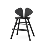 A modern black wooden counter stool with a unique split backrest resembling two wings, shown from a three-quarter angle on a white background.