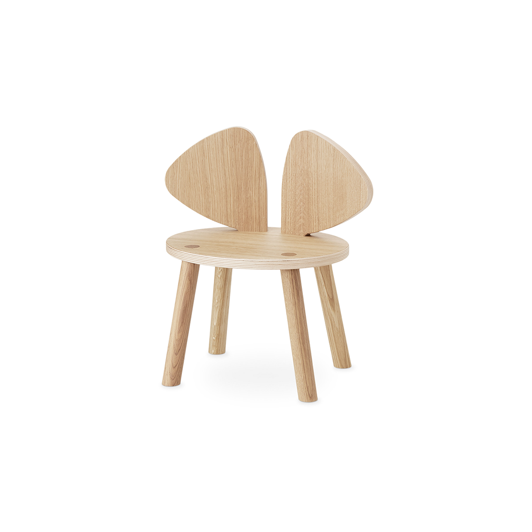 A light natural wood children's chair with a round seat, four legs, and a back made of two curved triangular panels, shown on a plain white background.