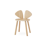 A light natural wood children's chair with a round seat, four tapered legs, and a back made of two curved wing-like panels, shown on a plain white background.