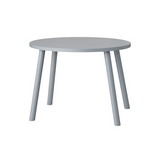 A minimalist round side table with a light gray painted wood finish and three tapered legs, shown against a plain white background.