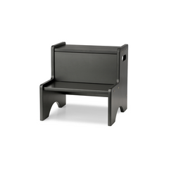 A minimalist black step stool with a rectangular backrest and integrated armrests, shown from a three-quarter angle on a white background.