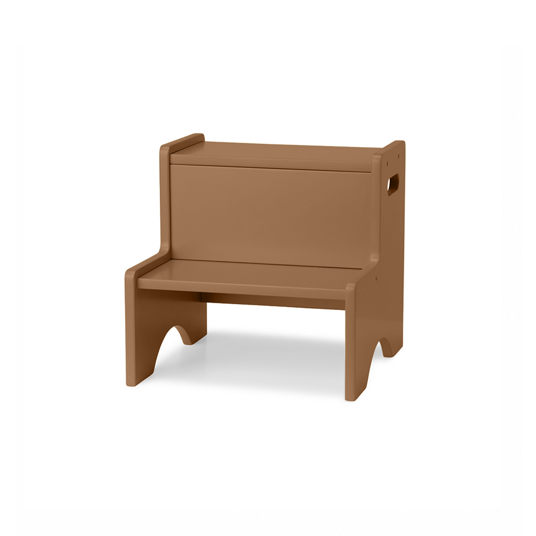 A minimalist, modern wooden bench with a solid backrest and integrated armrests, shown from a three-quarter angle on a clean white background.