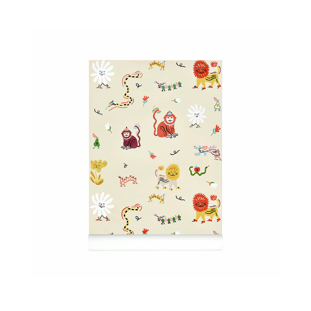 A roll of wallpaper with a whimsical cartoon pattern on a warm cream background. The pattern features colorful animals and flowers, including a red lion, a brown monkey, a yellow sun, and white flowers with blue centers.
