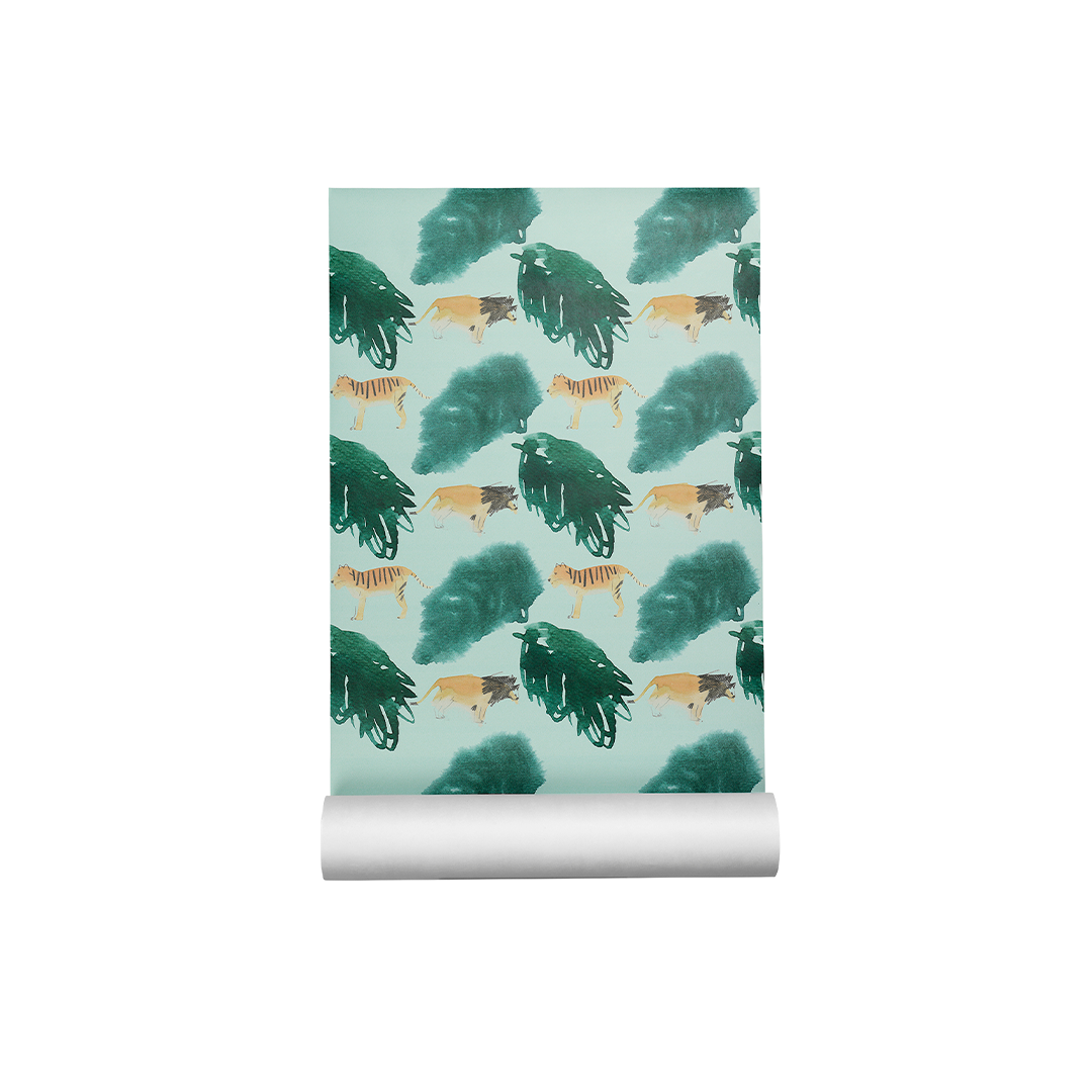 A roll of wallpaper with a repeating pattern of watercolor-style tigers and dark green trees on a pale mint background, shown partially unrolled against a plain white studio background.