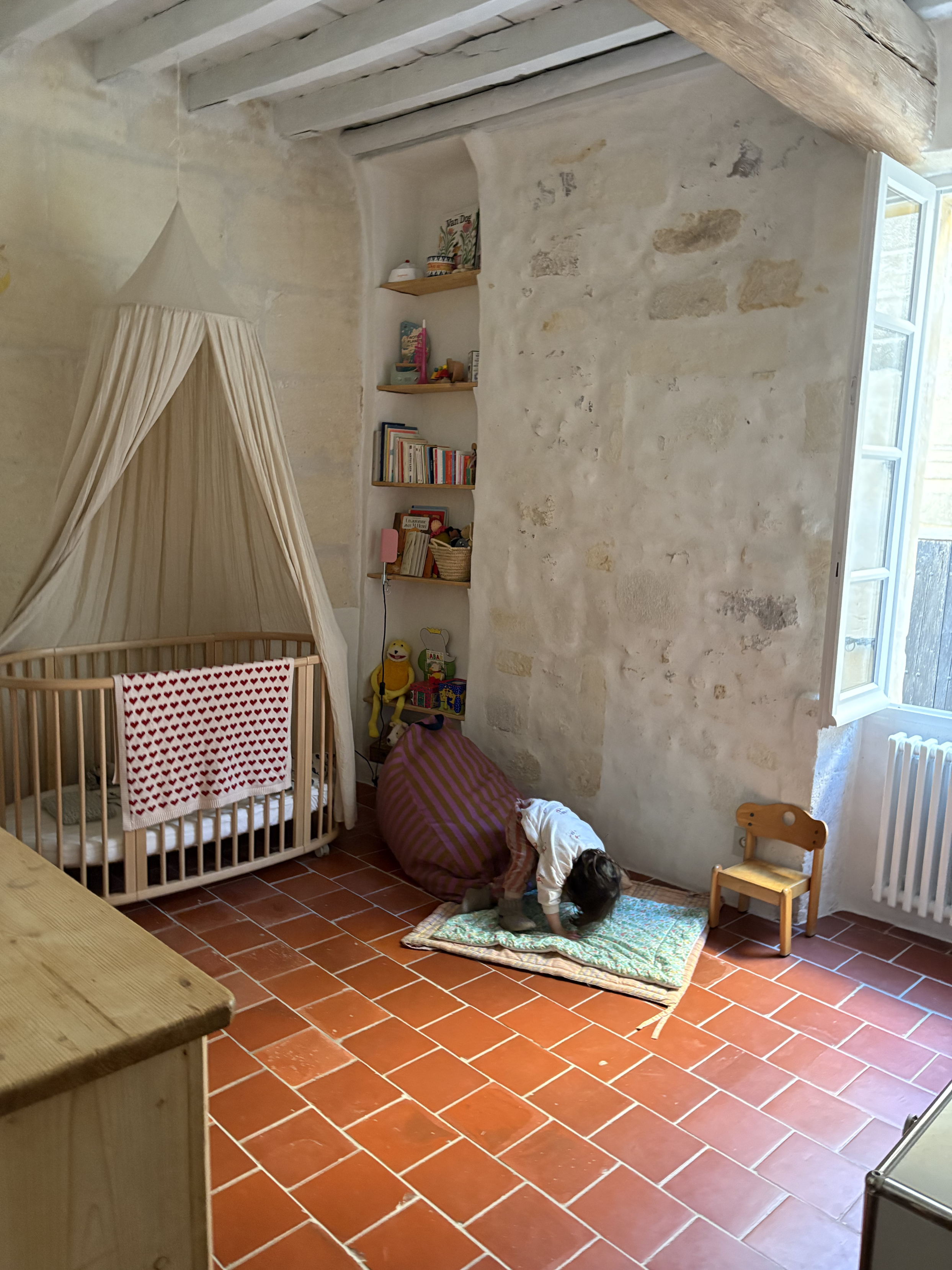 kids room with a baby bed