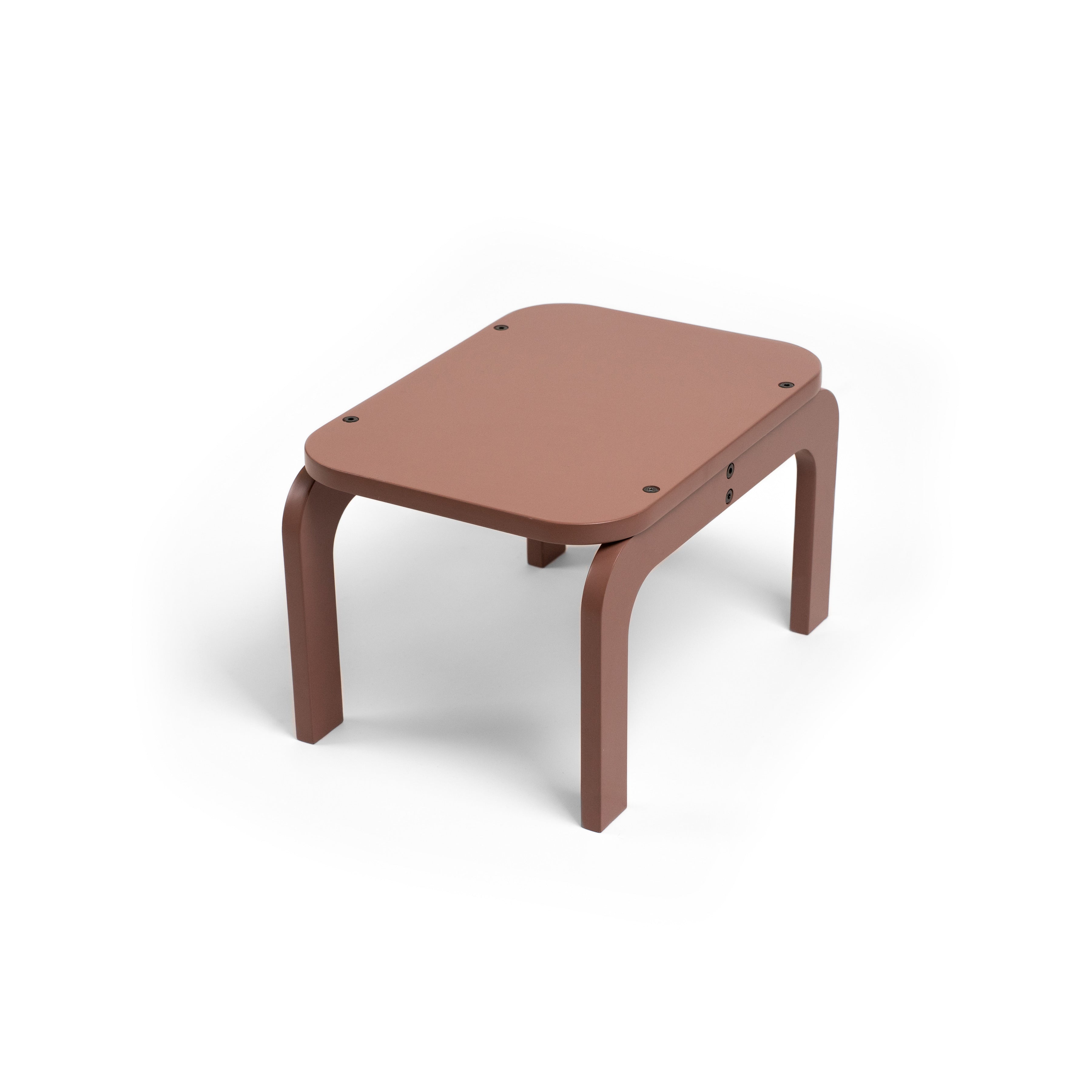 Brown children's table on a white background
