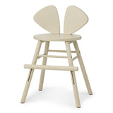 Beige chair with unique back design on a white background