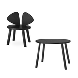 A black wooden chair with a unique wing-like backrest and a round side table with four legs, shown on a plain white background.