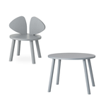 A light gray children's chair with a butterfly-like wing back and a matching round side table, shown on a plain white background.