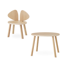 A light natural wood children's chair with a wingback-style back and a matching round side table, shown on a clean white background.