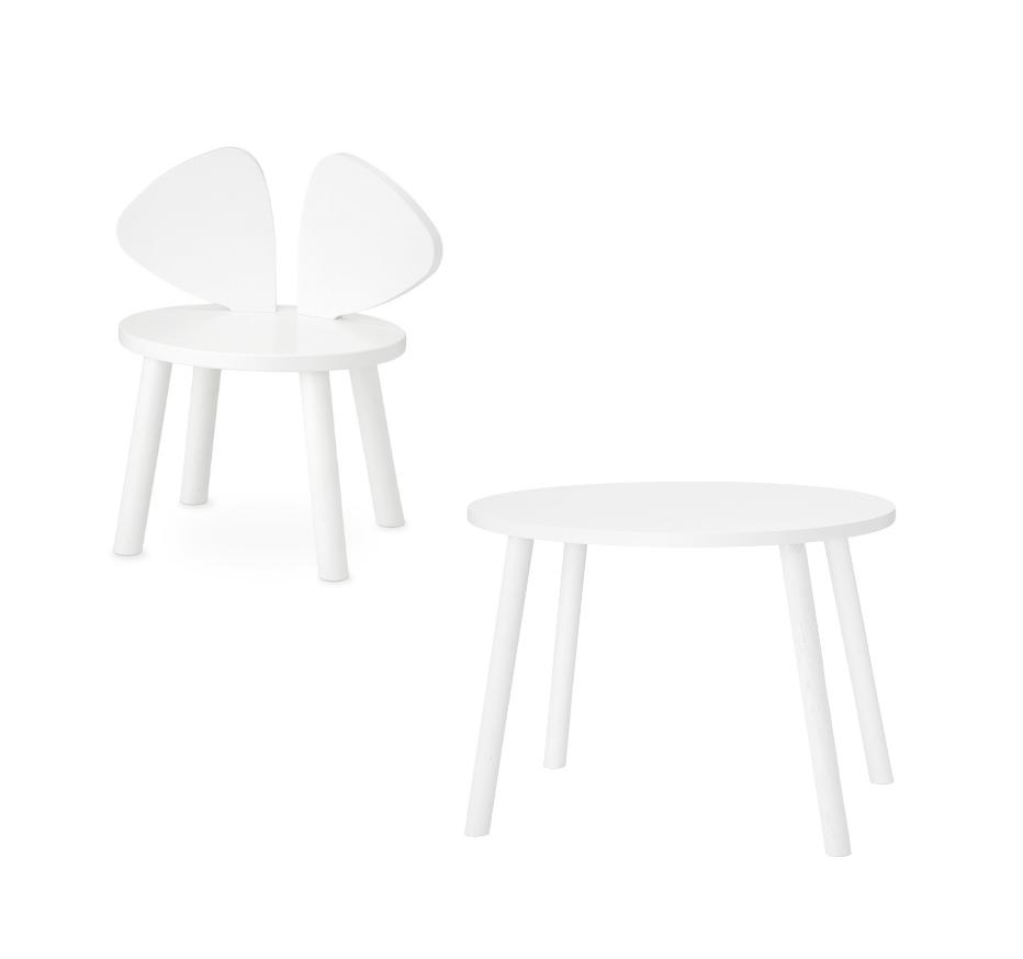 A white children's chair and matching round side table shown on a clean white background.
