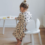 Girl sitting on Nofred White Mouse Chair