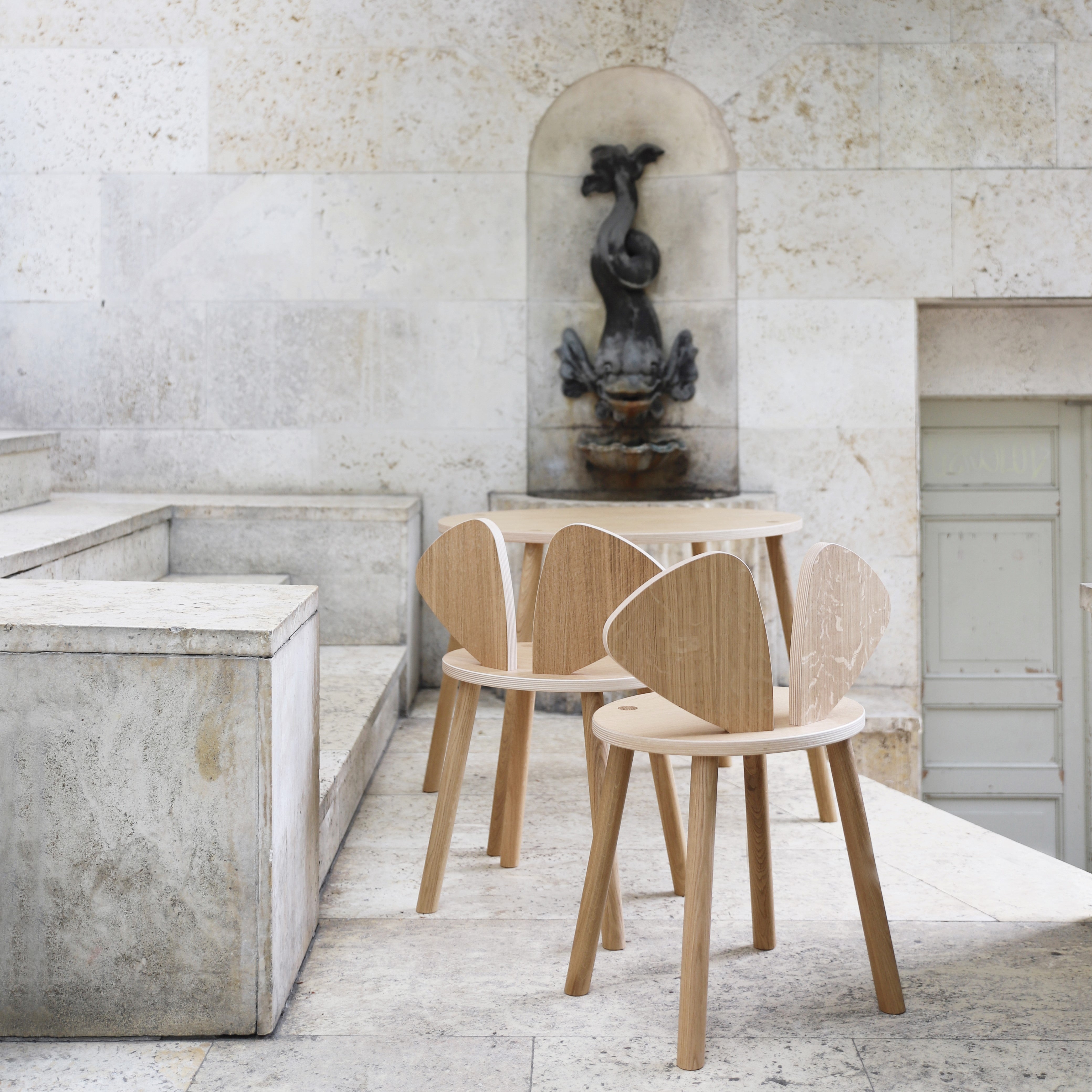 Nofred Oak Mouse School Chair in the urban scenery