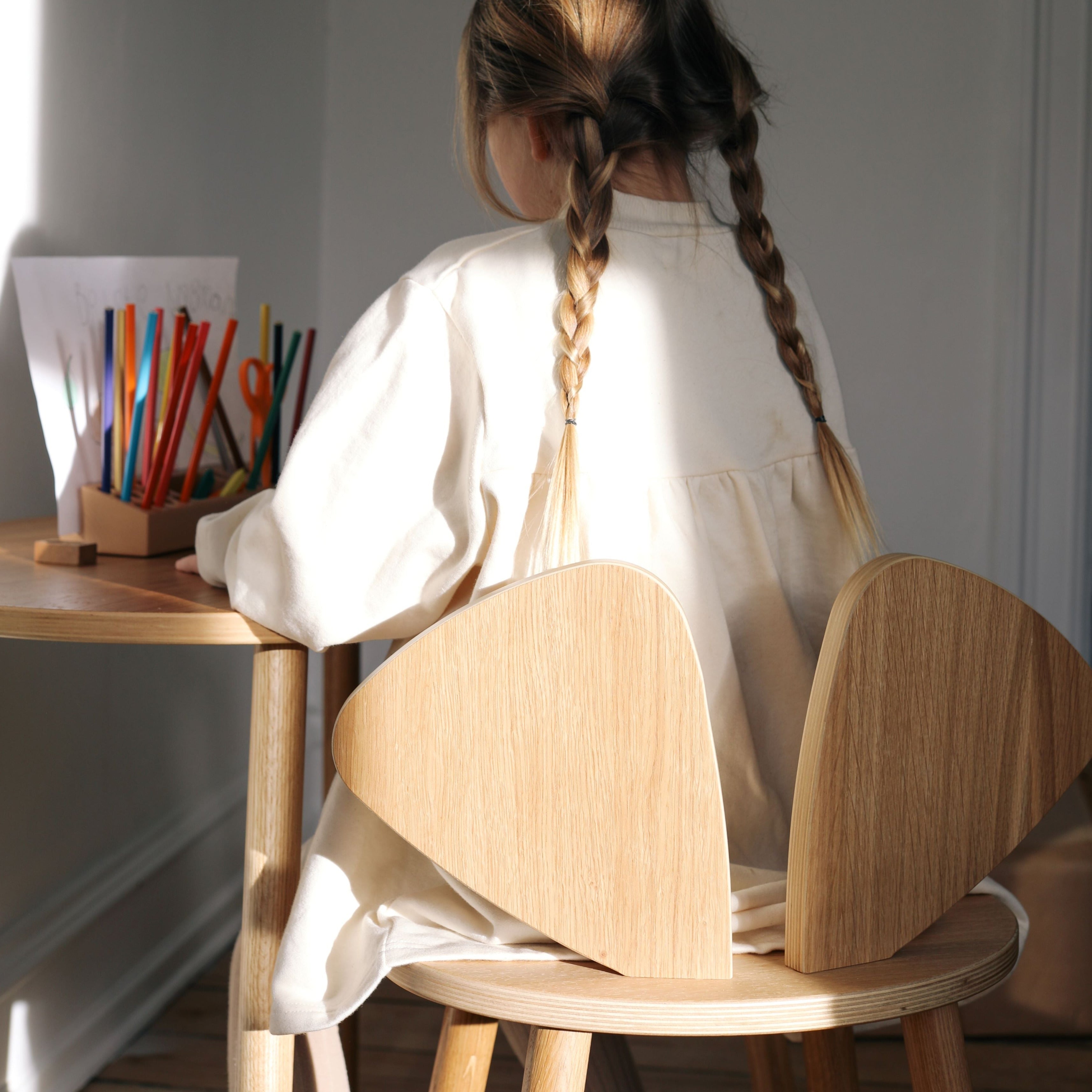 Nofred Oak Mouse School Set with a child sitting