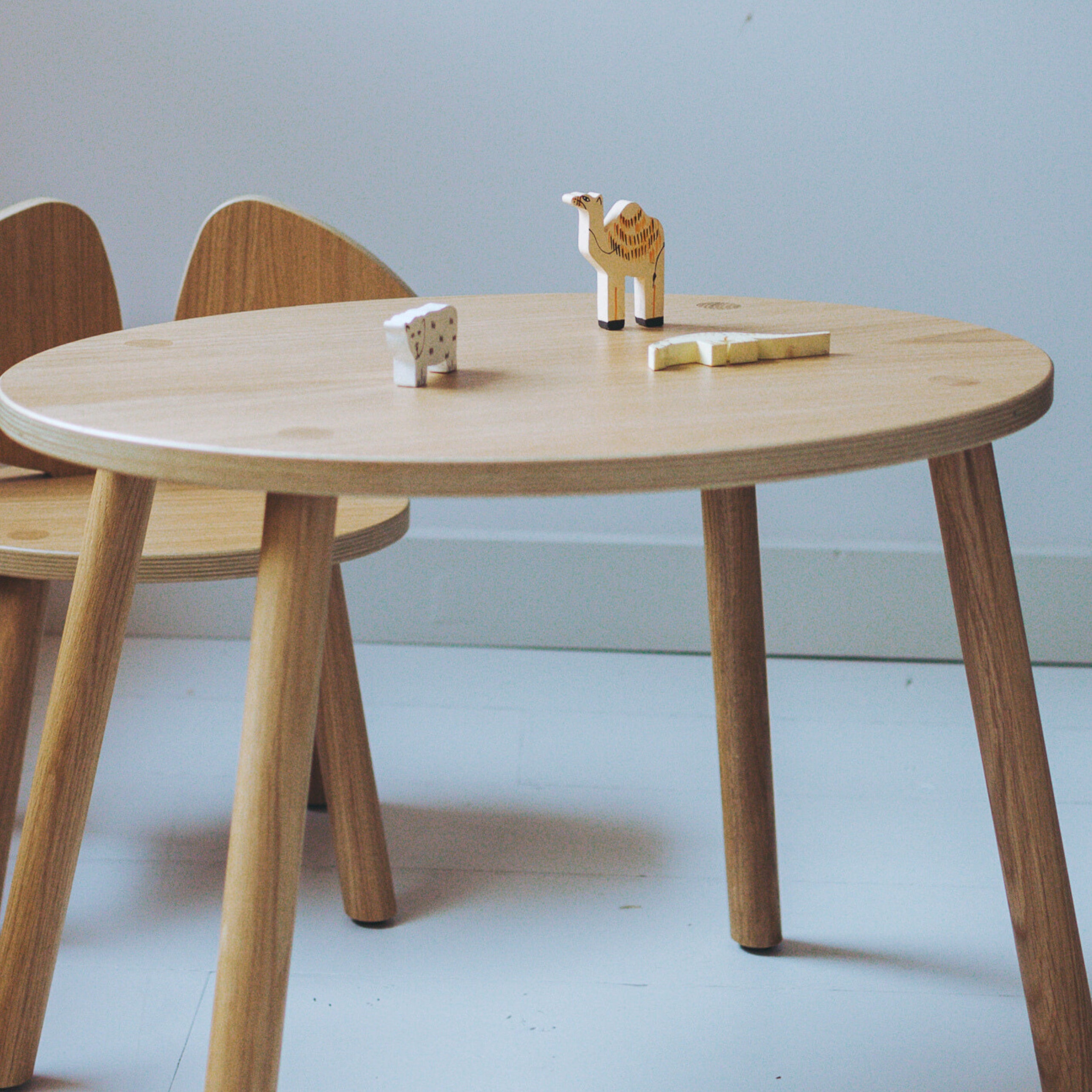 Nofred Oak Mouse Table with toys on it