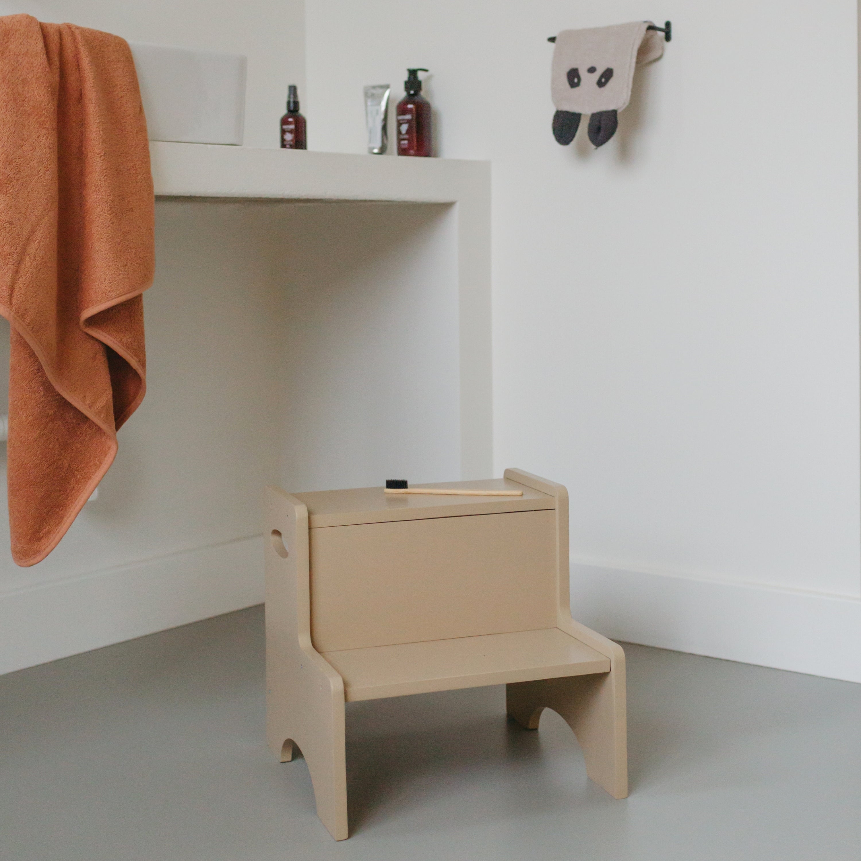 Nofred Beige Step Up Stool in the room