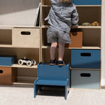 Child staying on the Nofred Blue Step Up Stool 