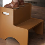 Child standing on Nofred Brown Step Up Stool