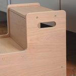 Wooden pet ramp with a small rectangular cutout on a neutral background