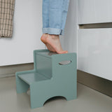 Child standing on Nofred Olive Green Step Up Stool
