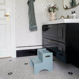 Nofred Olive Green Step Up Stool in the bathroom