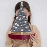 Girl holds Nofred Burgundy Toy Sailing Boat