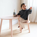 Girl sitting at Nofred Rosa Mouse Chair and Table Set