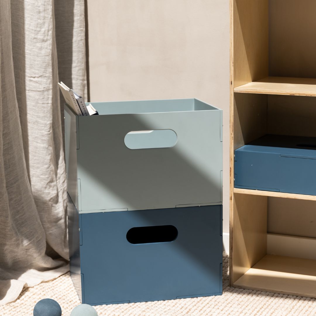 two Nofred Blue Kiddo Boxes on top of one another